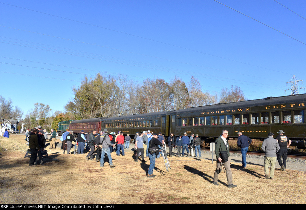 The several participants of the R&R 50th Anniversary Celebration board the photo charter special in the field just south of Bailey Street 